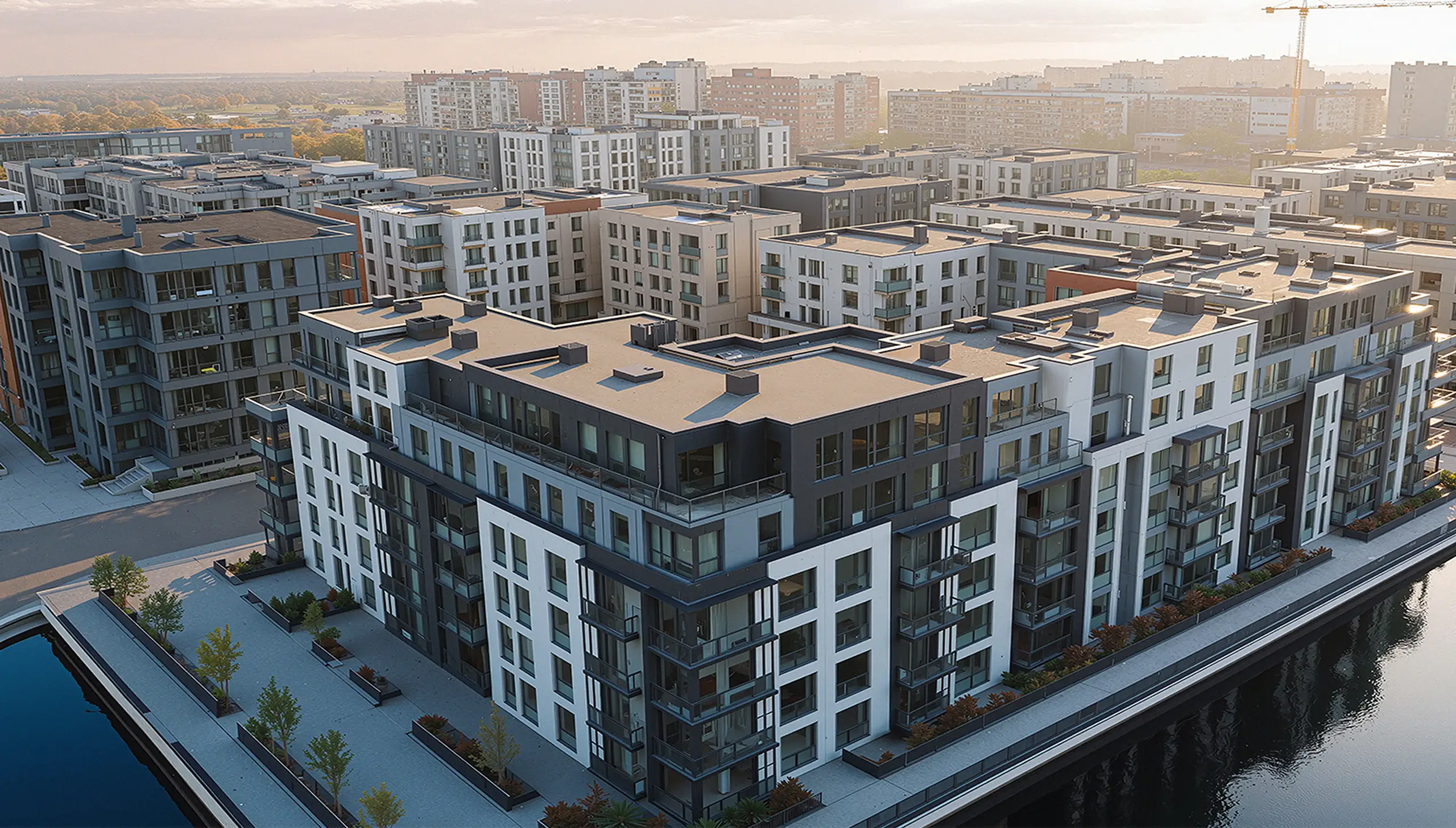 Beautiful area with apartment buildings near water, showing commercial buildings.