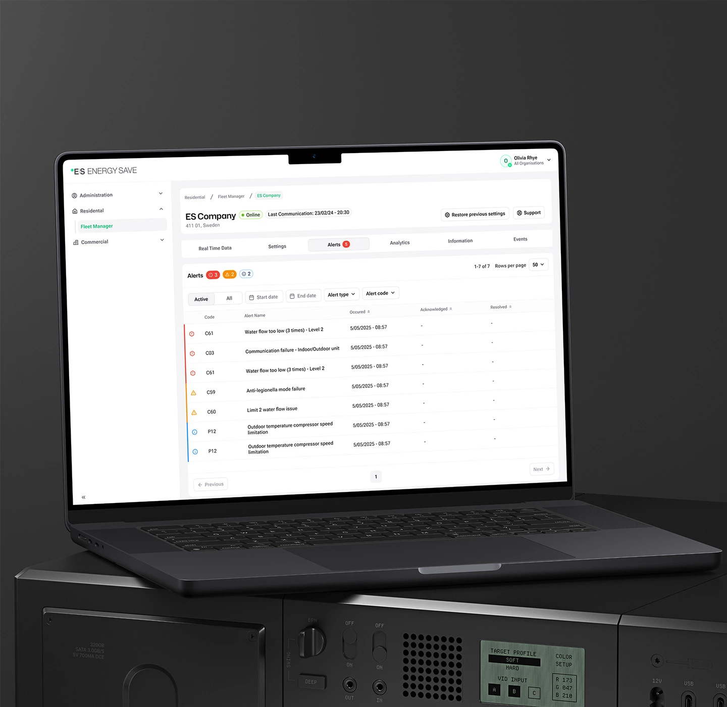 The Energy Save Fleet Manager user interface seen on laptop screen.